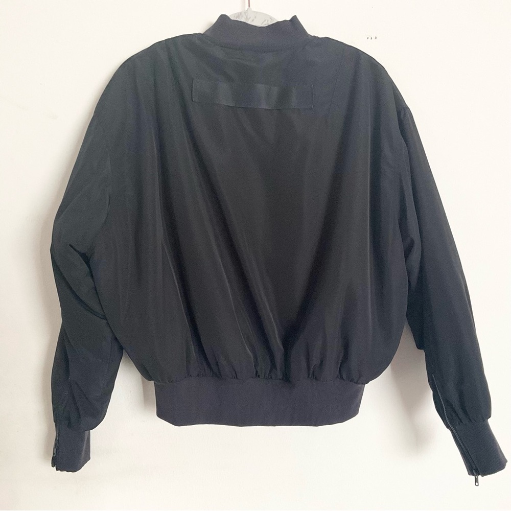 Alo Yoga Faux Fur Urbanite Bomber Jacket in Black/Ivory XS - Picture 12 of 16